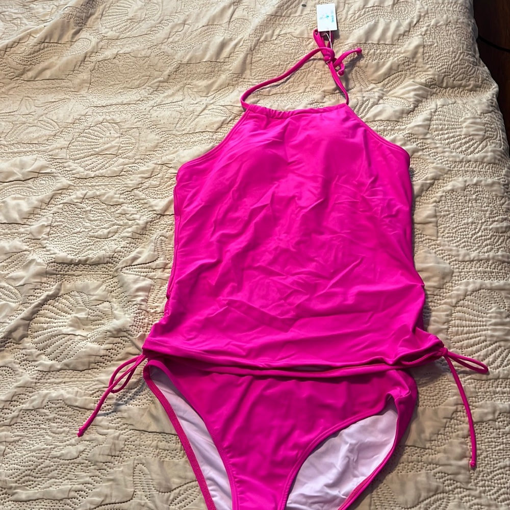 2 piece swimsuit in bright pink. Padding at bust but could be removed. Size xl.